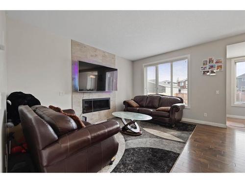 113 Redstone Park Ne, Calgary, AB - Indoor Photo Showing Living Room With Fireplace