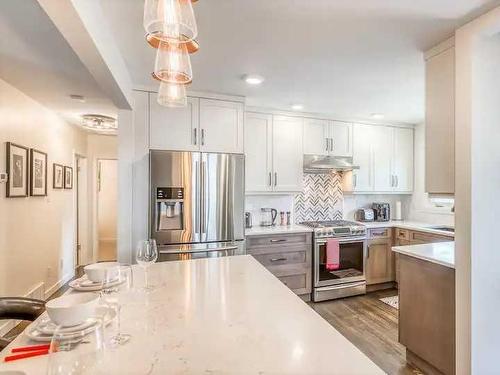 2715 63 Avenue Sw, Calgary, AB - Indoor Photo Showing Kitchen With Stainless Steel Kitchen