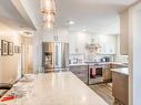 2715 63 Avenue Sw, Calgary, AB  - Indoor Photo Showing Kitchen With Stainless Steel Kitchen 