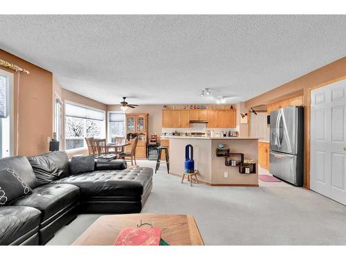 132 Tuscany Hills Circle Nw, Calgary, AB - Indoor Photo Showing Living Room