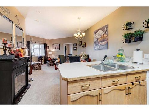 110-3 Parklane Way, Strathmore, AB - Indoor Photo Showing Kitchen With Double Sink