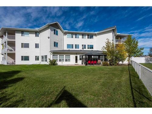 110-3 Parklane Way, Strathmore, AB - Outdoor With Facade