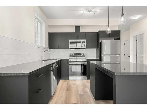 6301-15 Sage Meadows Landing Nw, Calgary, AB - Indoor Photo Showing Kitchen With Stainless Steel Kitchen With Upgraded Kitchen