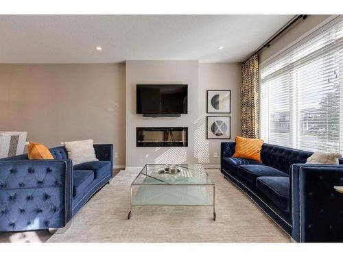 493 West Lakeview Drive, Chestermere, AB - Indoor Photo Showing Living Room With Fireplace