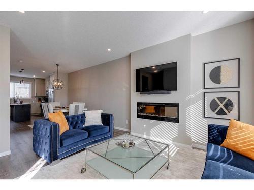 493 West Lakeview Drive, Chestermere, AB - Indoor Photo Showing Living Room With Fireplace