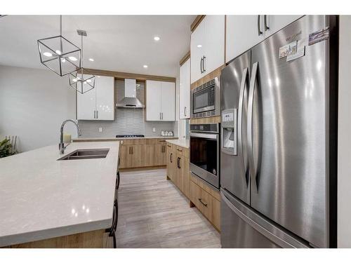 229 Walgrove Terrace Se, Calgary, AB - Indoor Photo Showing Kitchen With Stainless Steel Kitchen With Double Sink With Upgraded Kitchen