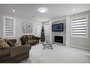 229 Walgrove Terrace Se, Calgary, AB  - Indoor Photo Showing Living Room With Fireplace 