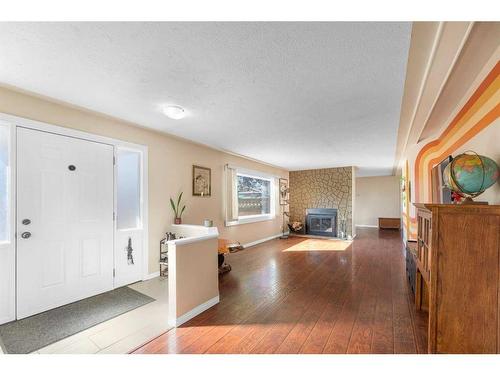 236 Huntwell Court Ne, Calgary, AB - Indoor With Fireplace