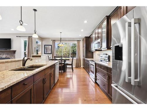 11 Silverado Skies Lane Sw, Calgary, AB - Indoor Photo Showing Kitchen With Double Sink With Upgraded Kitchen