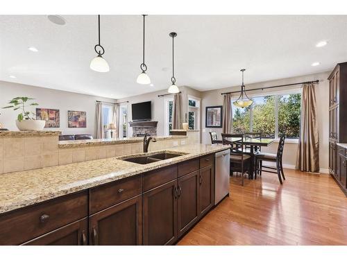 11 Silverado Skies Lane Sw, Calgary, AB - Indoor Photo Showing Kitchen With Double Sink