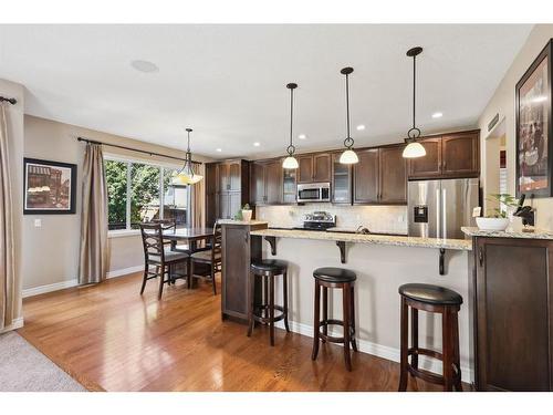 11 Silverado Skies Lane Sw, Calgary, AB - Indoor Photo Showing Kitchen With Stainless Steel Kitchen With Upgraded Kitchen