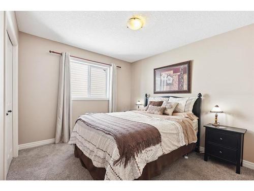 11 Silverado Skies Lane Sw, Calgary, AB - Indoor Photo Showing Bedroom