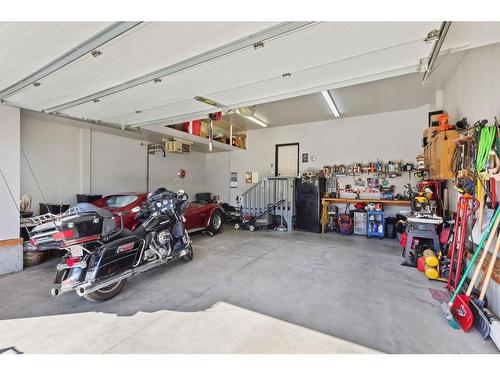 11 Silverado Skies Lane Sw, Calgary, AB - Indoor Photo Showing Garage