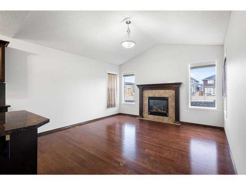 144 Evansborough Crescent Nw, Calgary, AB - Indoor Photo Showing Living Room With Fireplace