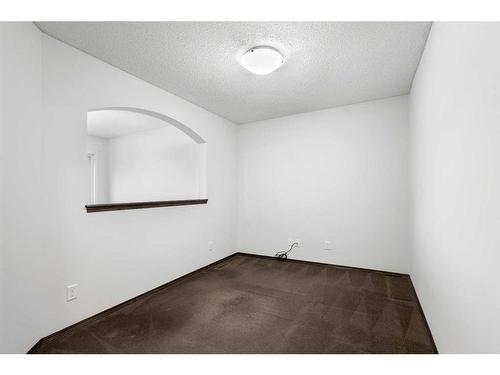 144 Evansborough Crescent Nw, Calgary, AB - Indoor Photo Showing Other Room