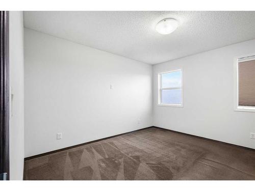 144 Evansborough Crescent Nw, Calgary, AB - Indoor Photo Showing Other Room