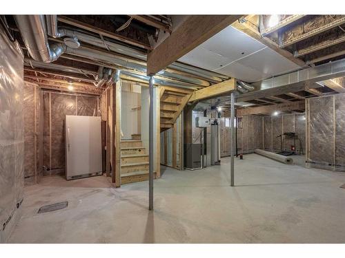 144 Evansborough Crescent Nw, Calgary, AB - Indoor Photo Showing Basement