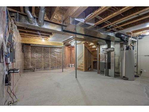 144 Evansborough Crescent Nw, Calgary, AB - Indoor Photo Showing Basement