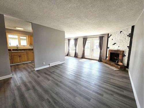 5134 42 Street, Olds, AB - Indoor With Fireplace