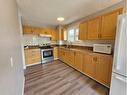 5134 42 Street, Olds, AB  - Indoor Photo Showing Kitchen With Double Sink 