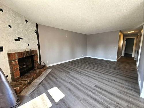 5134 42 Street, Olds, AB - Indoor With Fireplace