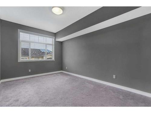 304-28 Auburn Bay Link Se, Calgary, AB - Indoor Photo Showing Other Room