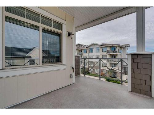 304-28 Auburn Bay Link Se, Calgary, AB - Outdoor With Balcony With Exterior