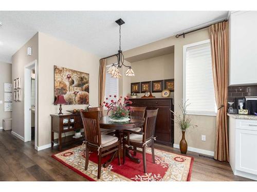 16 Emberside Green, Cochrane, AB - Indoor Photo Showing Dining Room