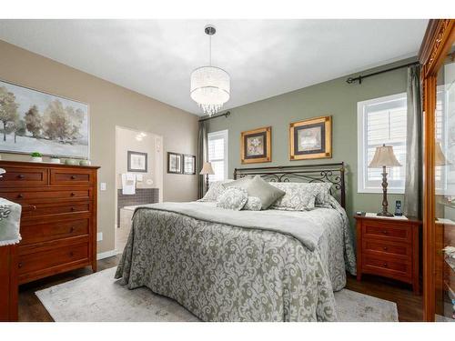 16 Emberside Green, Cochrane, AB - Indoor Photo Showing Bedroom