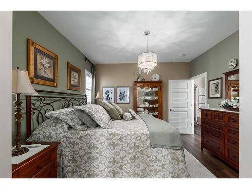 16 Emberside Green, Cochrane, AB - Indoor Photo Showing Bedroom