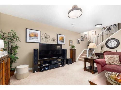 16 Emberside Green, Cochrane, AB - Indoor Photo Showing Living Room