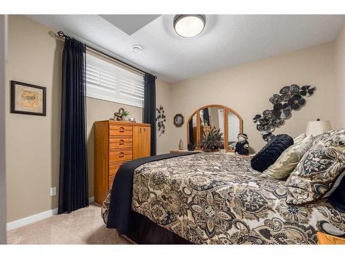 16 Emberside Green, Cochrane, AB - Indoor Photo Showing Bedroom