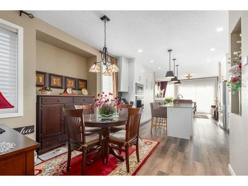 16 Emberside Green, Cochrane, AB - Indoor Photo Showing Dining Room