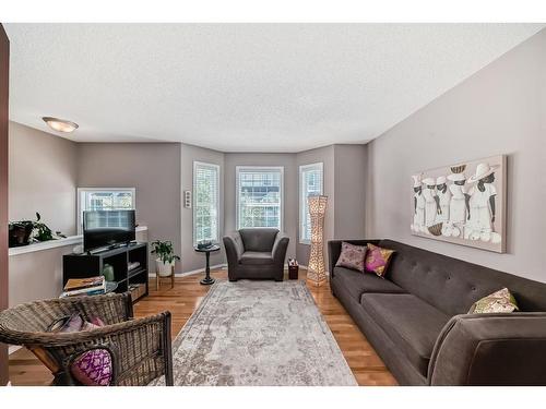 75 Tuscany Springs Gardens Nw, Calgary, AB - Indoor Photo Showing Living Room