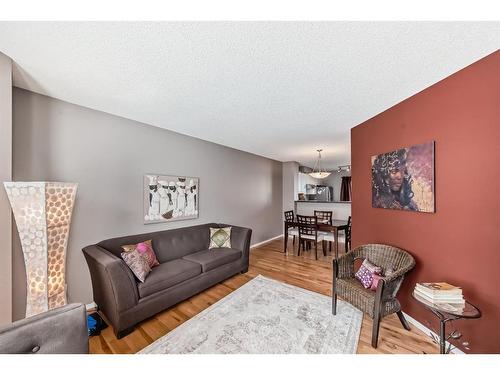 75 Tuscany Springs Gardens Nw, Calgary, AB - Indoor Photo Showing Living Room