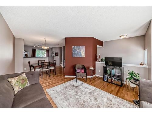 75 Tuscany Springs Gardens Nw, Calgary, AB - Indoor Photo Showing Living Room