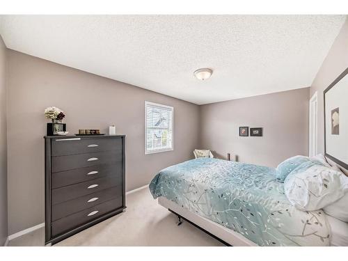 75 Tuscany Springs Gardens Nw, Calgary, AB - Indoor Photo Showing Bedroom