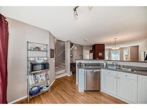 75 Tuscany Springs Gardens Nw, Calgary, AB - Indoor Photo Showing Kitchen With Double Sink