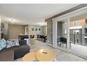 2220-4641 128 Avenue Ne, Calgary, AB  - Indoor Photo Showing Living Room 