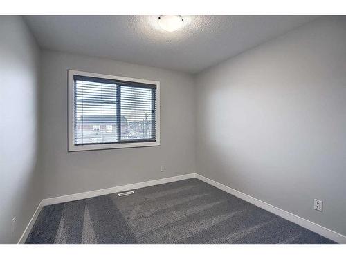 41 Sora Gate Se, Calgary, AB - Indoor Photo Showing Other Room