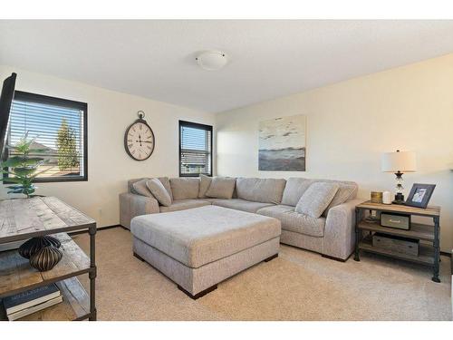 35 Brightonwoods Grove Se, Calgary, AB - Indoor Photo Showing Living Room