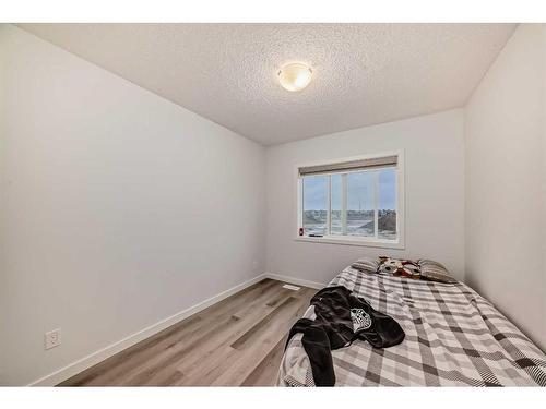 502-137 Red Embers Link Ne, Calgary, AB - Indoor Photo Showing Bedroom