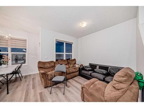 502-137 Red Embers Link Ne, Calgary, AB - Indoor Photo Showing Living Room