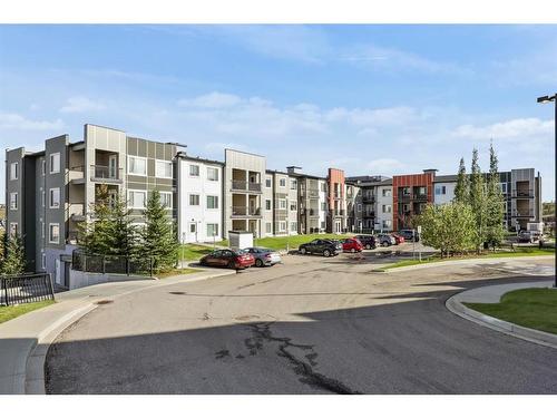 122-4 Sage Hill Terrace Nw, Calgary, AB - Outdoor With Balcony With Facade