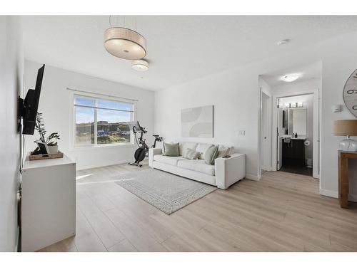 122-4 Sage Hill Terrace Nw, Calgary, AB - Indoor Photo Showing Living Room With Fireplace