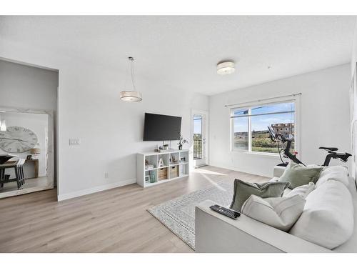 122-4 Sage Hill Terrace Nw, Calgary, AB - Indoor Photo Showing Living Room