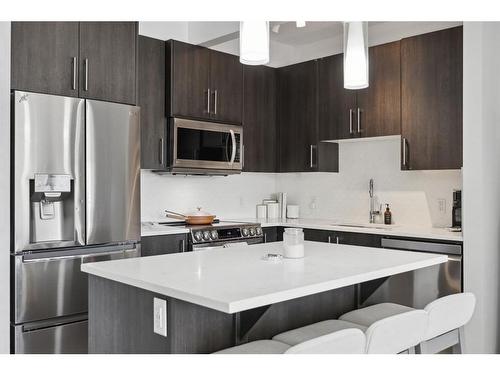 122-4 Sage Hill Terrace Nw, Calgary, AB - Indoor Photo Showing Kitchen With Upgraded Kitchen