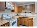 2135-70 Glamis Drive Sw, Calgary, AB  - Indoor Photo Showing Kitchen 