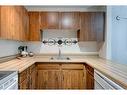 2135-70 Glamis Drive Sw, Calgary, AB  - Indoor Photo Showing Kitchen 