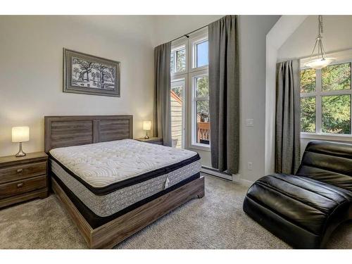 104-201 Muskrat Street, Banff, AB - Indoor Photo Showing Bedroom